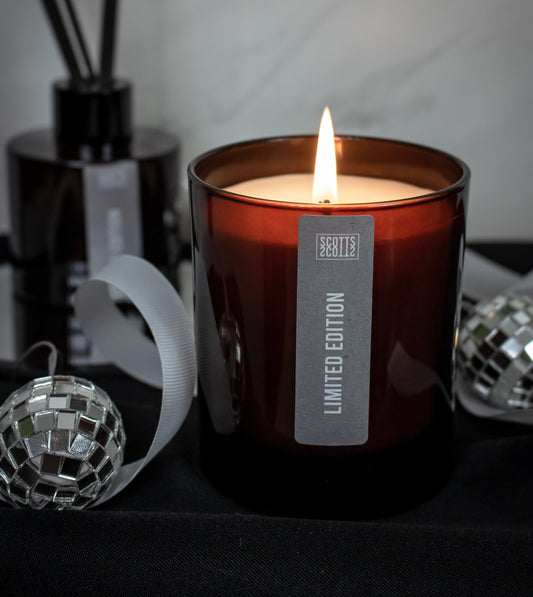 Christmas home fragrance with handmade reed diffuser, candle and festive styling