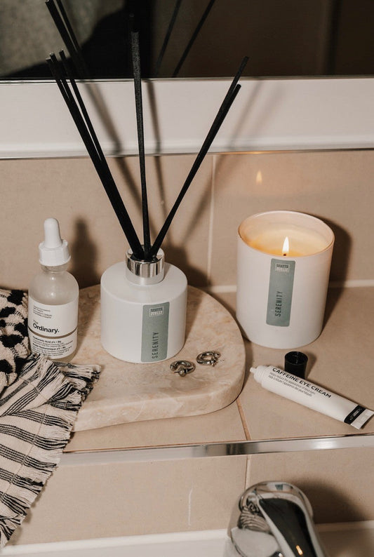 Handmade reed diffuser adding fragrance to a bathroom